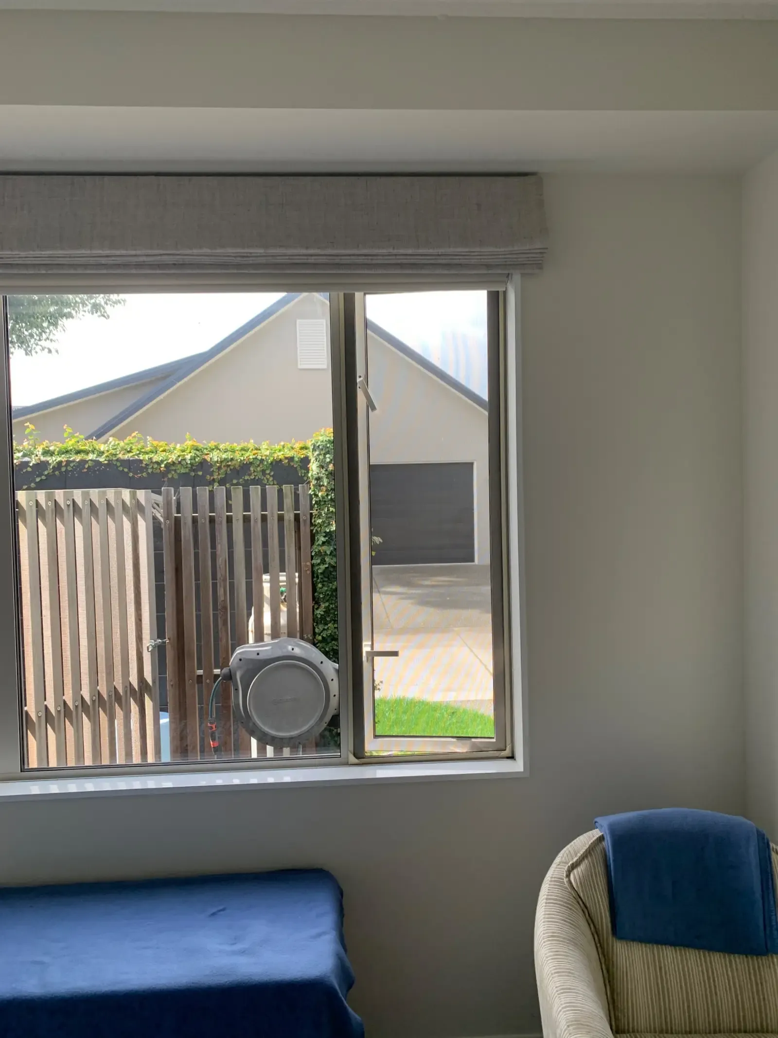 Magnetic insect screen fitted over a bedroom casement window, Cambridge