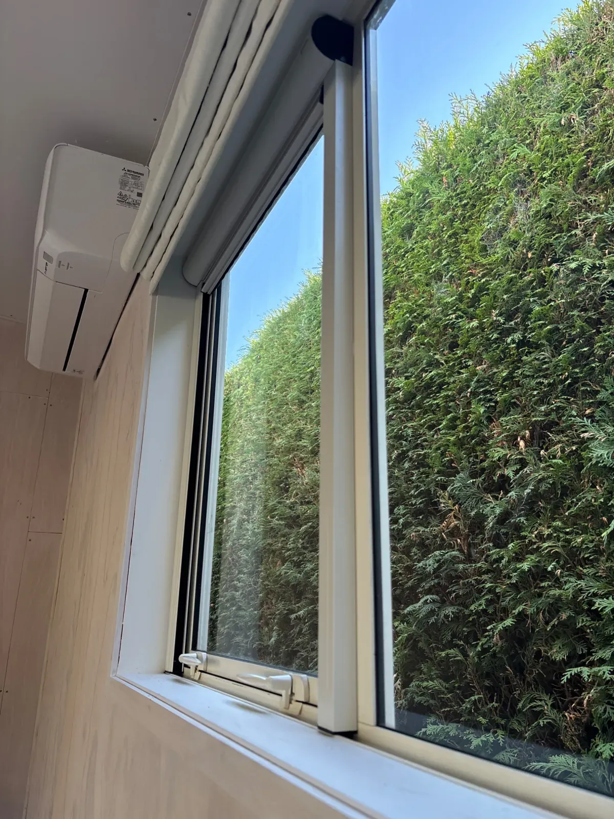 White Serene screen fitted to the inside of a sleepout awning window at Lake Taupō
