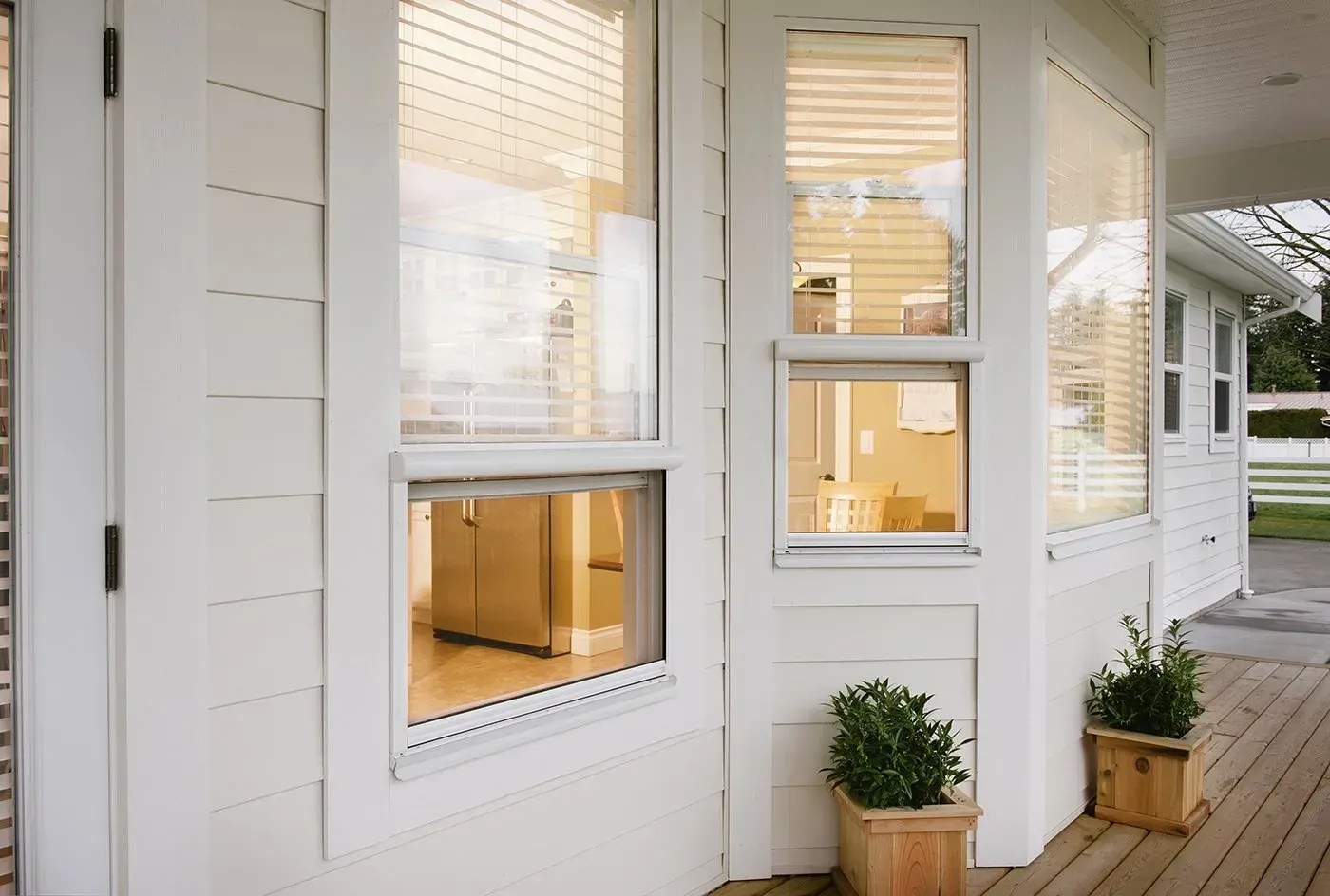 Serene retractable screens across a run of windows