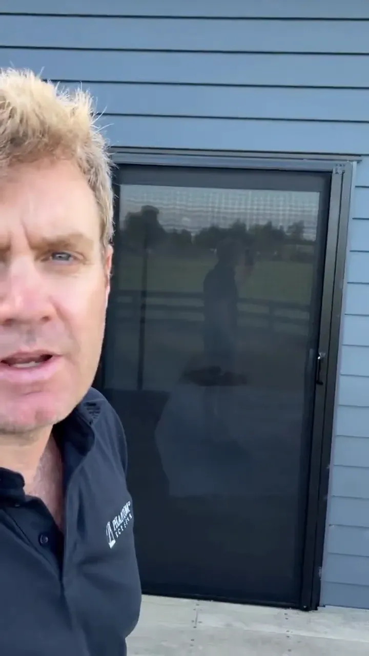 A MeshLock retractable screen across a ranch slider door