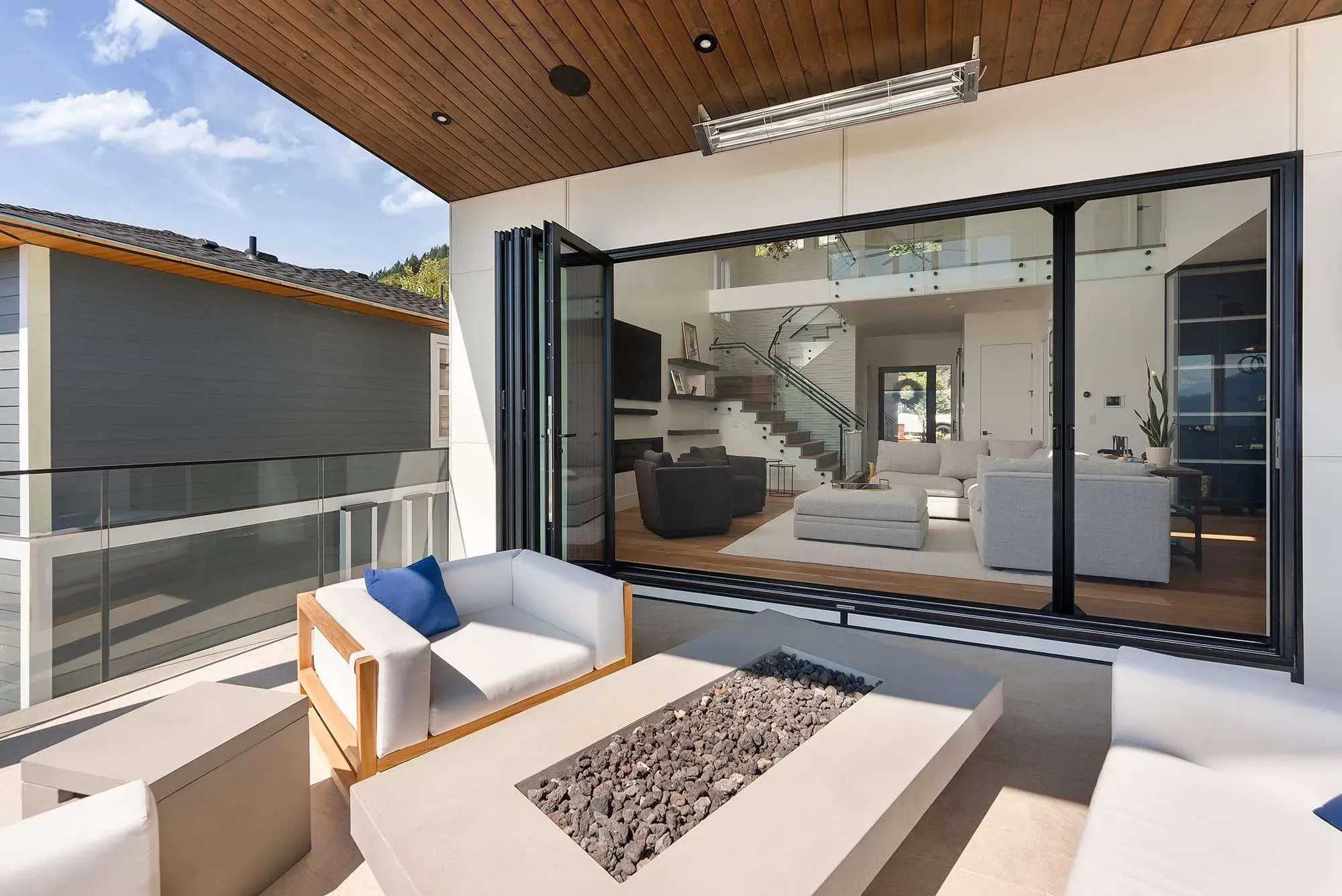 Phantom Wall Screen across wide bifold doors onto a deck